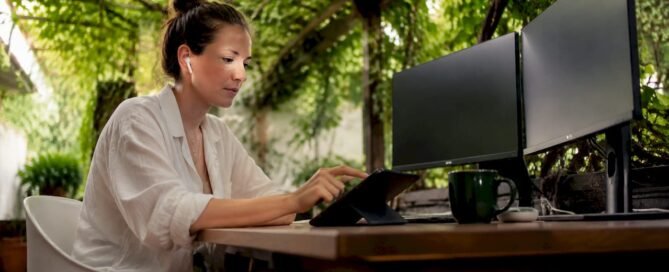 Creator using online tip jar on tablet at home studio