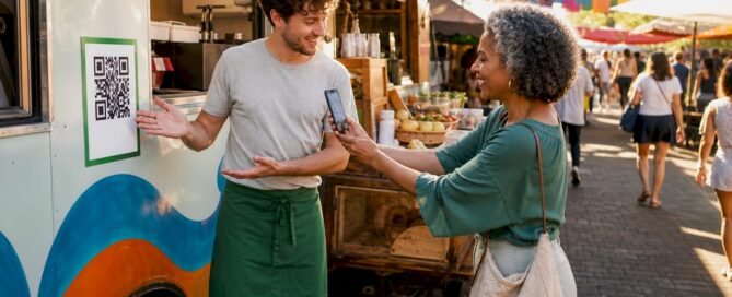 Customer scanning QR code at café counter