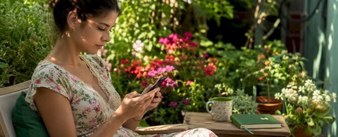 Creator reviewing Shoplinky alternatives on smartphone