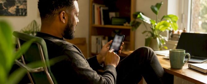 Person tapping to share payment link on phone