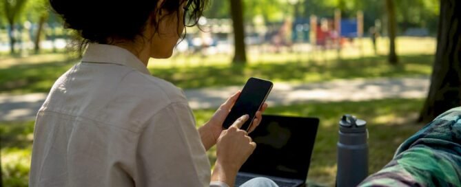 Freelancer sharing payment link on smartphone