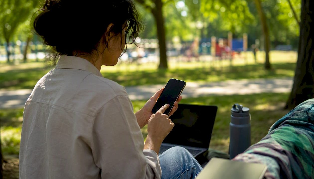 Freelancer sharing payment link on smartphone