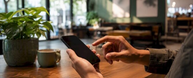Hands sharing payment link on smartphone