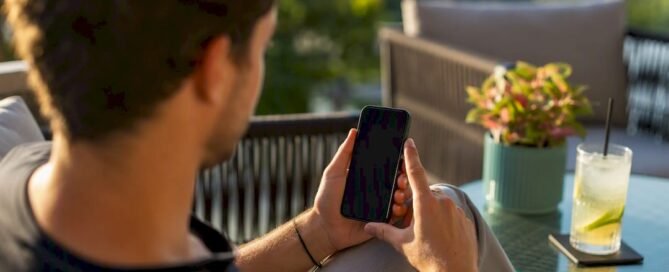 Person adjusting tip link on smartphone