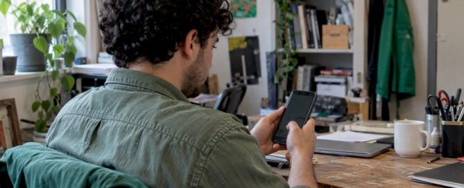 Creator adding a tipping link on their phone