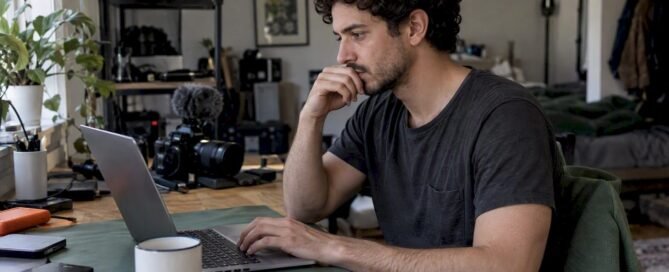 Creator comparing tip jar options on laptop