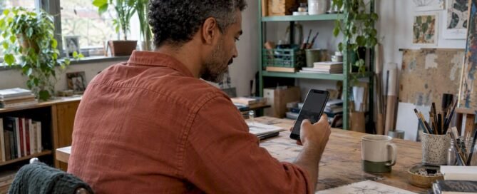 Creator checks tip totals in his studio